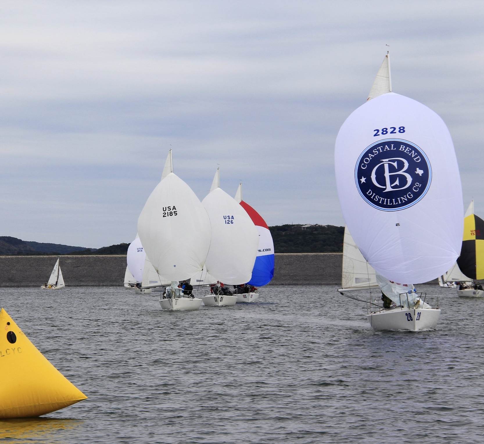 Doug Weekly sailing with a UK Sailmakers spinnaker Lake Canyon. Notice how well the head of the chute opens.