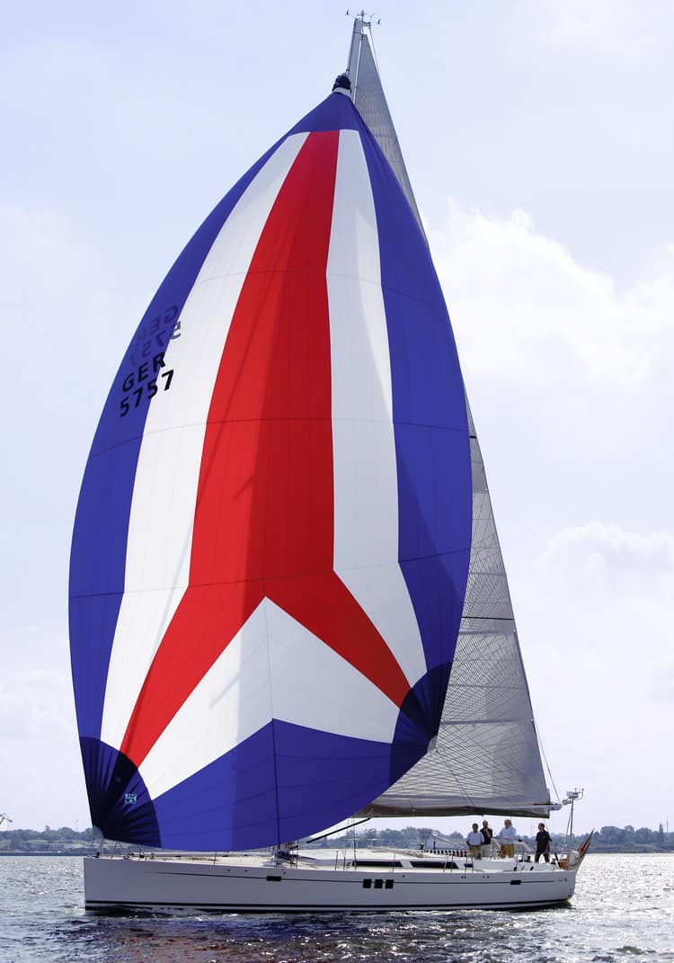 A crossing of J/109 EQUINOX (starboard), and Windward 30 PITORAQ (port), both sailing with Titanium sails from UK Sailmakers Northwest. Photo credit: Andrew Madding.