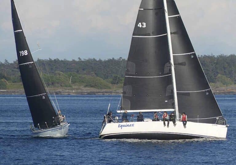 A crossing of J/109 EQUINOX (starboard), and Windward 30 PITORAQ (port), both sailing with Titanium sails from UK Sailmakers Northwest. Photo credit: Andrew Madding.