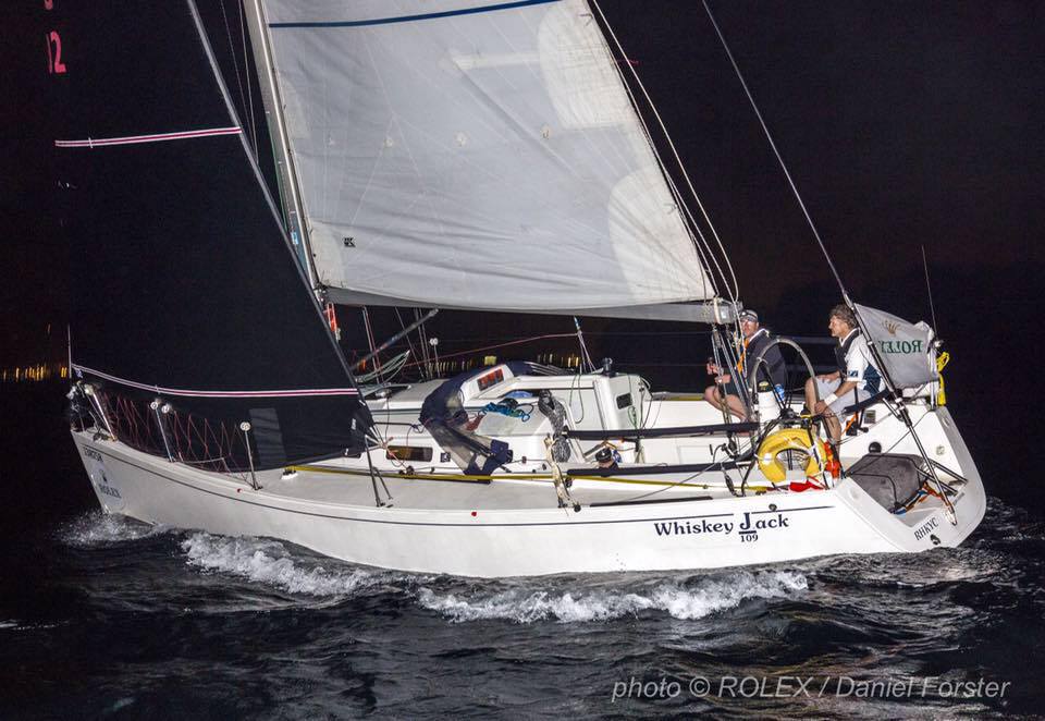 The J/109 WHISKEY JACK crossing the finish line in Subic Bay after a windy China Sea Race.