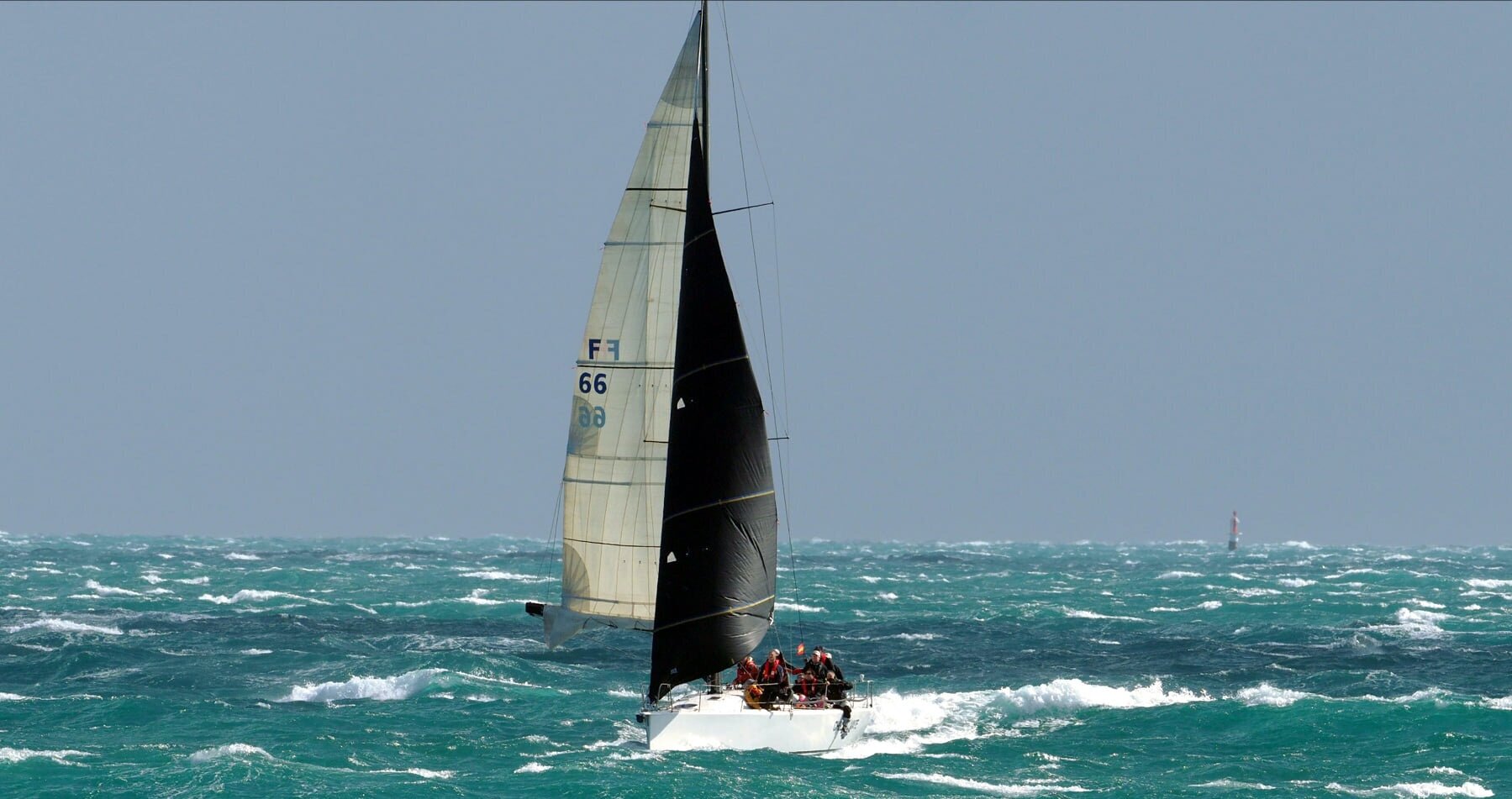 Geoff Bishop’s King 40 CHECKMATE sailing wing-on-wing with her No. 4 genoa and reefed main. Photos by Lindsay Preece, Ironbark Photos.