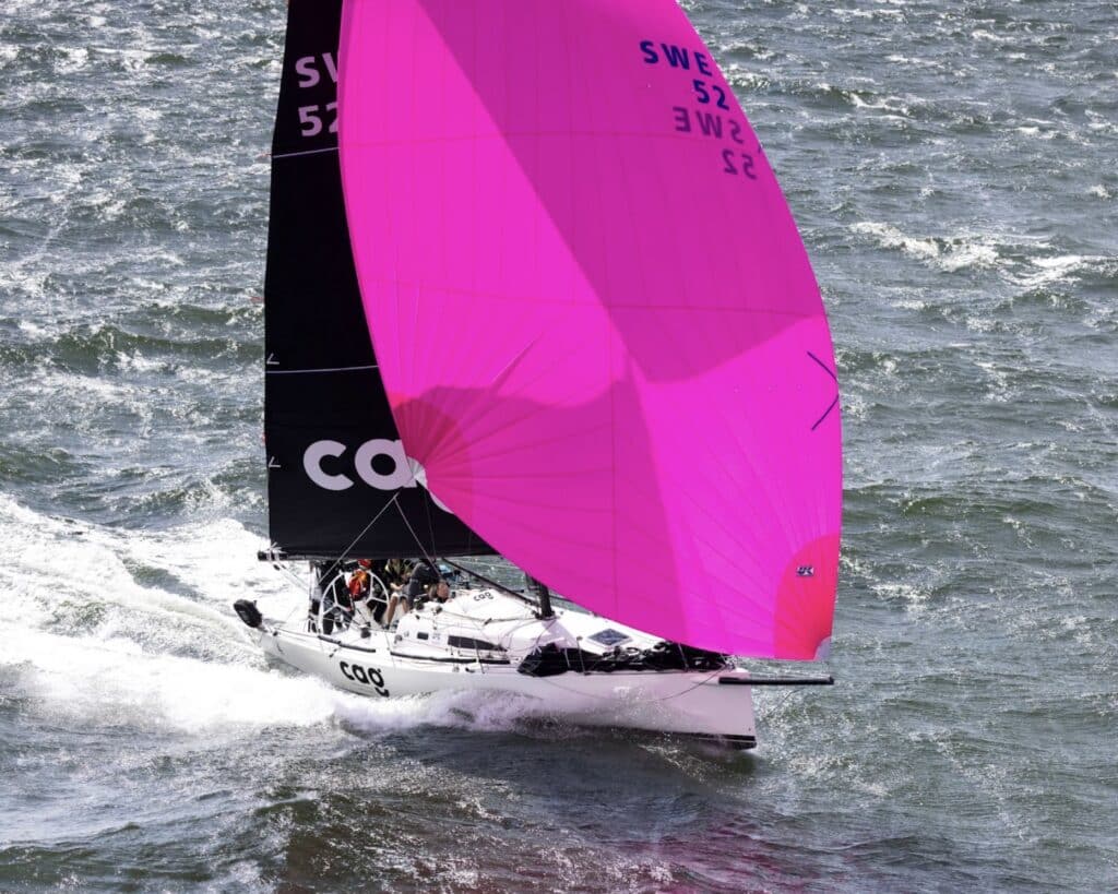 J/111 CAG races downwind towards the Alma Grund Lighthouse in the 2022 Gotland Runt. Photography credit: Henrik Trygg.