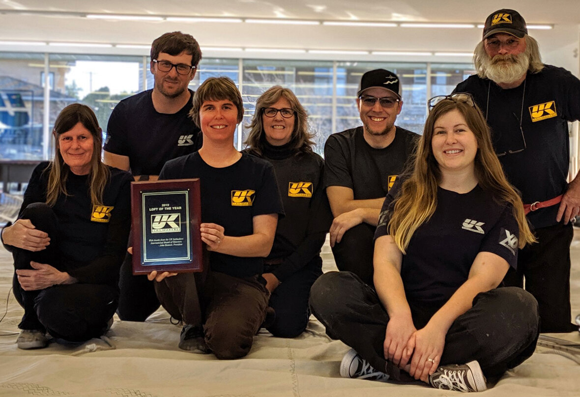 Stuart and Joy Dahlgren (second and third from the left) with UK Sailmakers Northwest’s staff.