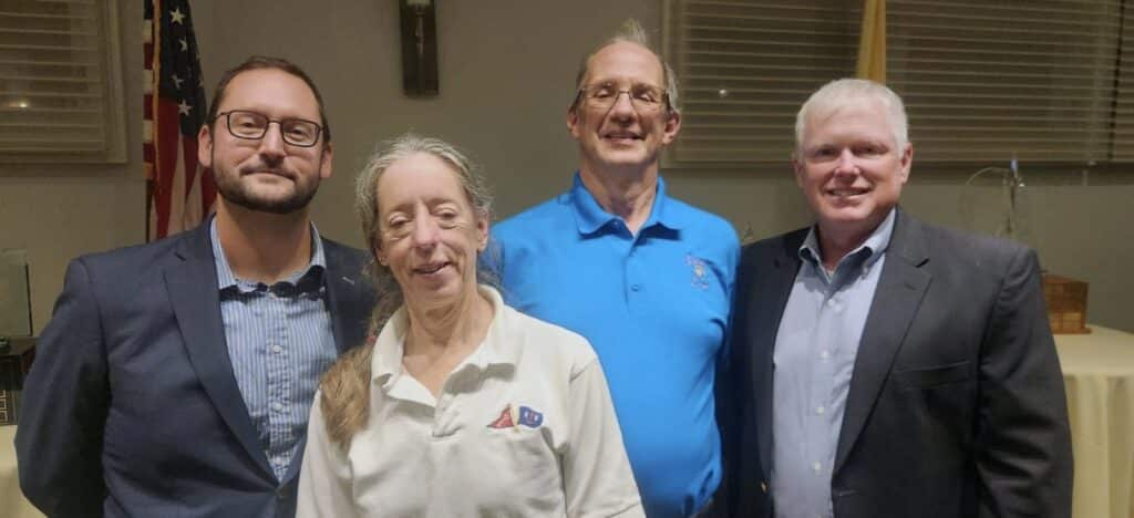 The 2023 Keyworth Yacht Club season champions are, (L to R) - Greg Kotzas, Division 1, sailing OSPREY a J/35, Diane Blondell, race committee chairperson, Terry Sculac, Navigator class champion, racing NAUTI-LASS, a Jenneau 45, and Bill Mulholland, winner of the Division 2 class, sailing CELTIC STAR, a Sabre 34.