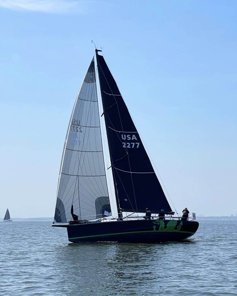 Andrew Weiss’s Italia 11.98 CHRISTOPHER DRAGON sailing with their UK Sailmakers Northeast J0 Tweener. Image Credit: Buttons Padin.