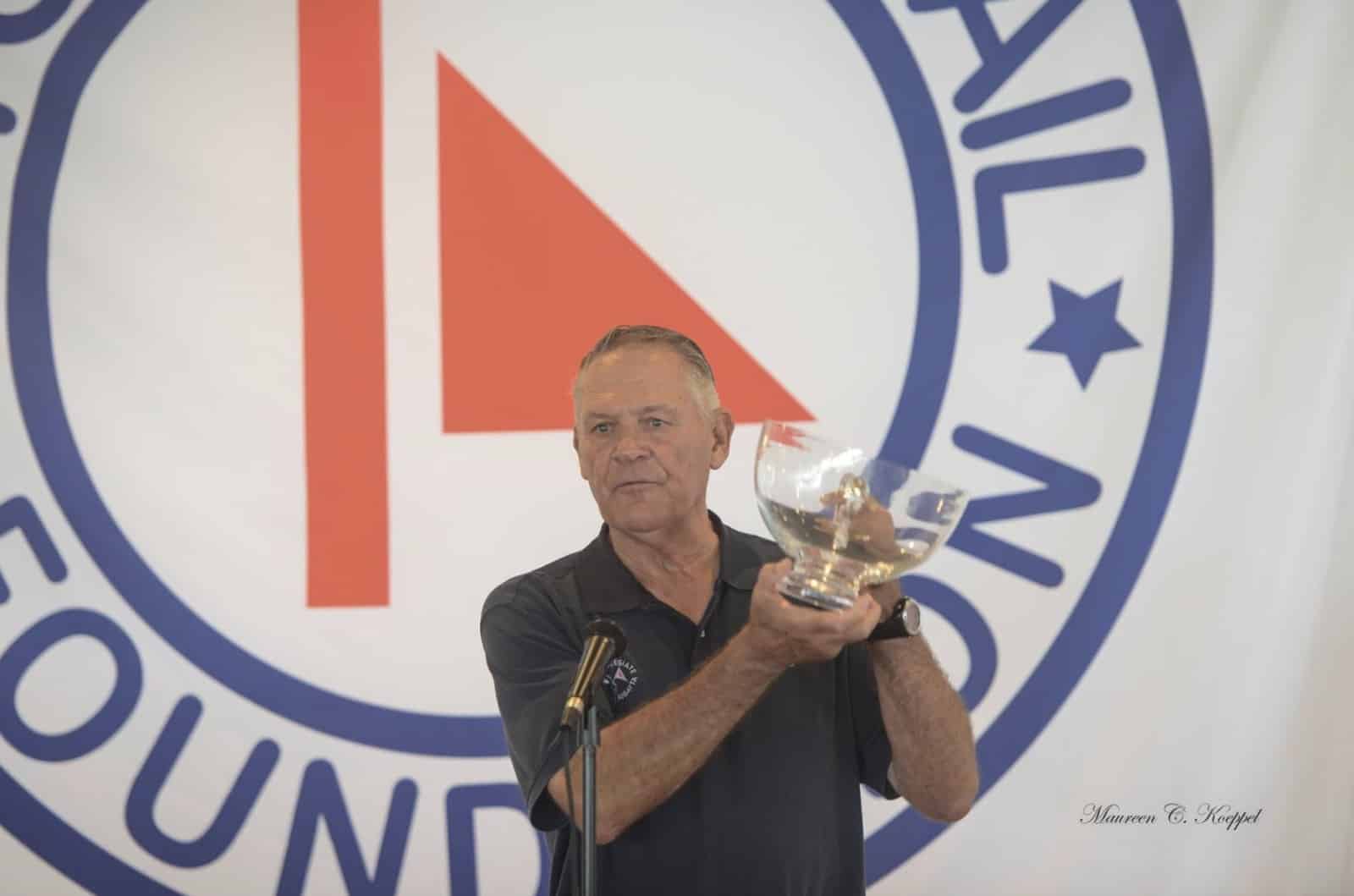 2017 Intercollegiate Offshore Regatta PRO, Butch Ulmer presenting an award in honor of the late Thomas Carroll to the PHRF 1 Class winner, the team from Webb Institute sailing on Oakcliff Sailing's Farr 40. Photo by Maureen Koeppel.